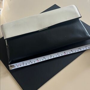 Elegant Black and Cream Leather Clutch